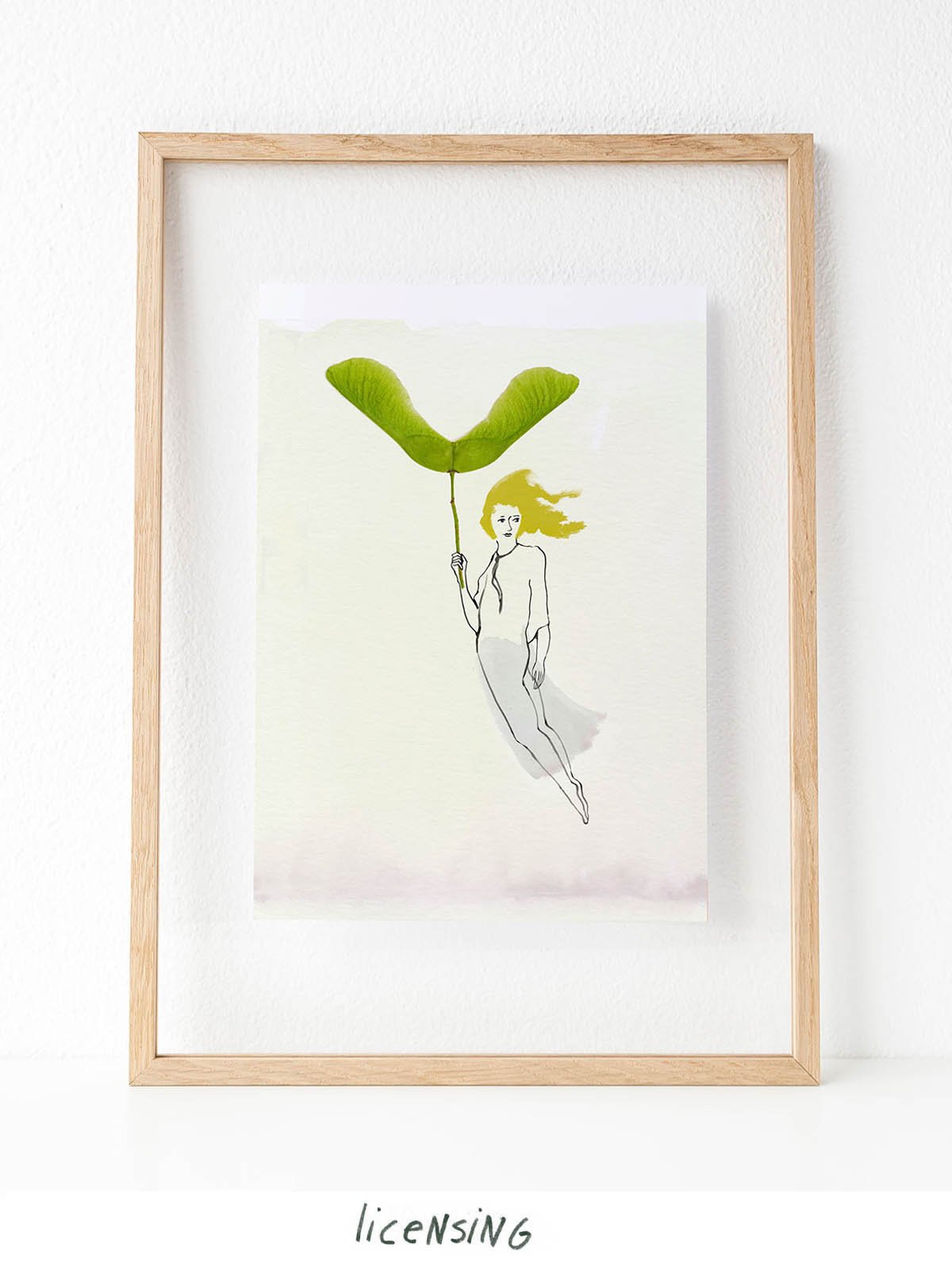 Art print of a woman floating with a green maple seed, combining illustration and nature elements.”